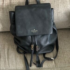 Kate spade black backpack grained leather with draw string and snap closure